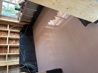 Flat, glossy liquid screed floor poured in a room