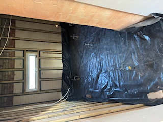 Tanking membrane laid across a room ready for liquid screed